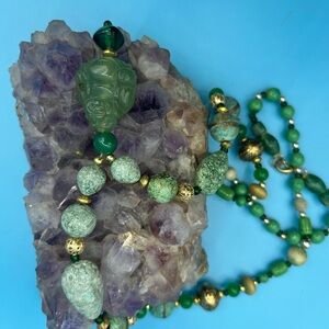 Green Beaded Necklace with Gold Accents and Buddha